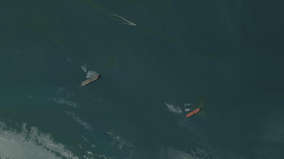 This satellite image from Planet Labs PBC shows the seized oil tankers Niovi, left, and Advantage Sweet, right, off the coast of Bandar Abbas, Iran, Saturday, May 6, 2023. Satellite images analyzed Sunday, May 7, 2023, by The Associated Press showed the location of two oil tankers recently seized by Iran amid tensions with the West. (Planet Labs PBC via AP)