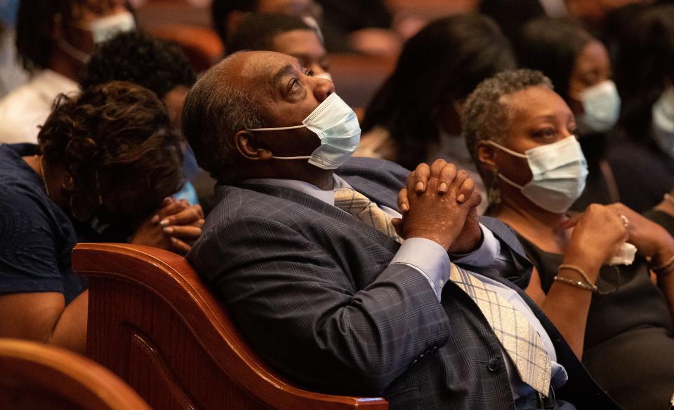 Andrew Martin, cousin of Richard Clark, looks up during the funeral for Clark on Tuesday, Sept. 27, 2022, in Memphis. Clark was killed in a shooting spree Sept. 7 that left two others dead and three injured.