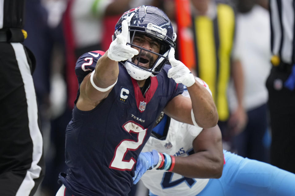 Houston Texans wide receiver Robert Woods (2) celebrates a first down against the Tennessee Titans during the second half of an NFL football game Sunday, Dec. 31, 2023, in Houston. (AP Photo/Eric Christian Smith)