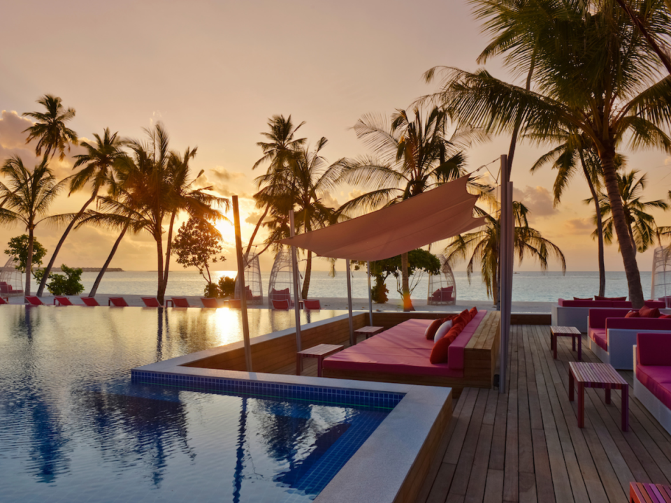 The pink-hued main pool area has its own bar (Kandima)