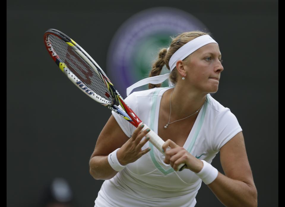 Petra Kvitova of the Czech Republic plays a return to Varvara Lepchenko of the United States during a third round women's singles match at the All England Lawn Tennis Championships at Wimbledon, England, Saturday, June 30, 2012.