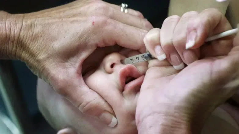 A baby receives a test for respiratory syncytial virus (RSV), the leading cause of lung infections among infants and young children.