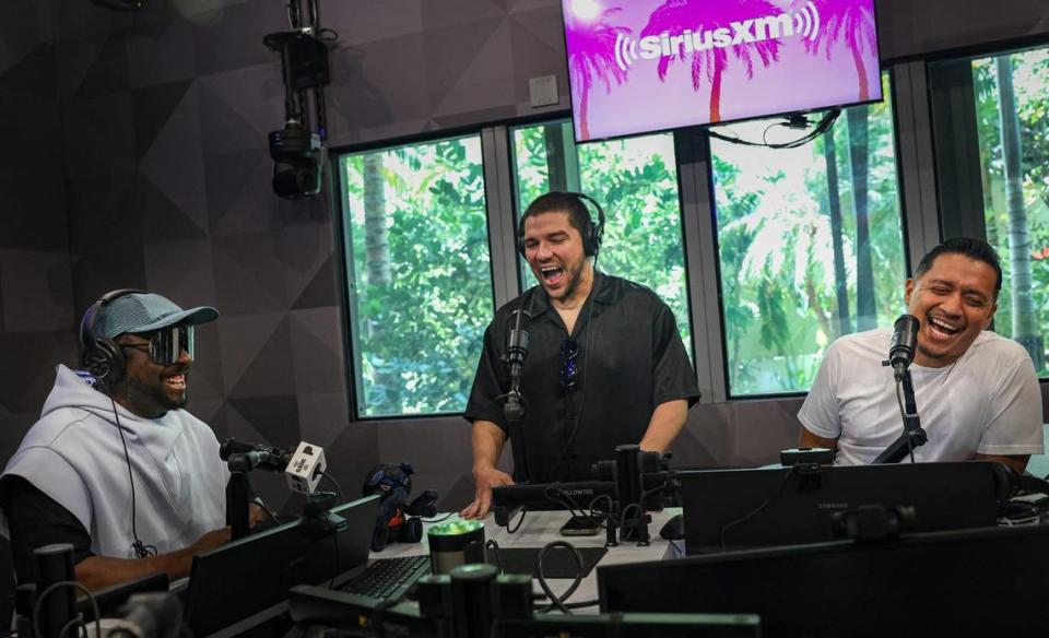 Will.i.am, left, talks to SiriusXM about his new song coming out this week in honor of Formula1 during opening week of SiriusXM’s new studio on Thursday, May 4, 2023, in Miami Beach.