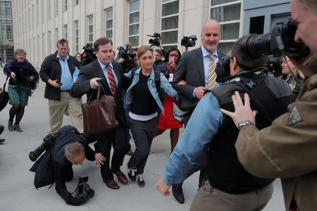 Actress Allison Mack, known for her role in the TV series "Smallville", departs after being granted bail following being charged with sex trafficking and conspiracy in New York, U.S., April 24, 2018. REUTERS/Lucas Jackson