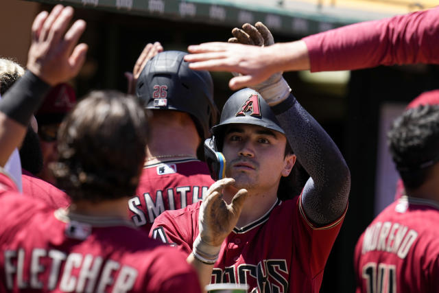 Arizona Diamondbacks' Lourdes Gurriel Jr. looks from the dugout