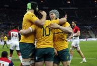 France Rugby - France v Australia - Stade de France, Saint-Denis near Paris, France, 19/11/2016. Australia's Bernard Foley (C) celebrates with team mates after scoring a try during his match against France. REUTERS/Benoit Tessier