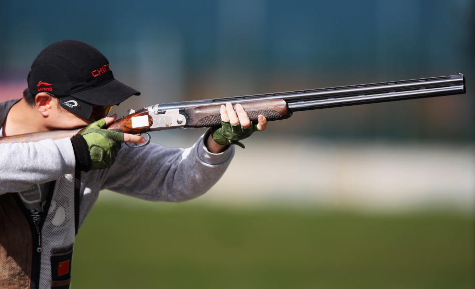 <b>Yu Du - China - Shooting - Men's Trap </b><br> Yu Du of China in action during qualifying for the Men's Trap on day nine of the ISSF Shooting World Cup LOCOG Test Event for London 2012 at The Royal Artillery Barracks on April 27, 2012 in London, England. (Photo by Bryn Lennon/Getty Images)