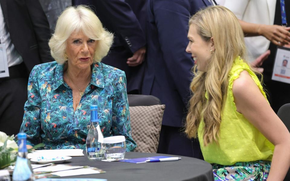 Camilla, Duchess of Cornwall and Carrie Johnson, wife of Prime Minister Boris Johnson, speak as they attend a Violence Against Women and Girls event at the Kigali Convention Centre on June 23, 2022 in Kigali, Rwanda - Chris Jackson/Getty Images