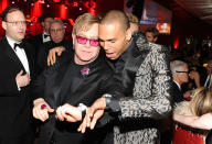 Sir Elton John and Chris Brown attend Chopard at 21st Annual Elton John AIDS Foundation Academy Awards Viewing Party at Pacific Design Center on February 24, 2013 in West Hollywood, California.