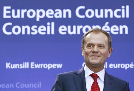 Former Polish Prime Minister Donald Tusk attends a ceremony with outgoing European Council President, Herman Van Rompuy (not in picture), during which Tusk took over Van Rompuy replacing him as head of the European Council, in Brussels, December 1, 2014. REUTERS/Yves Herman