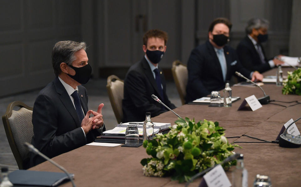 United States Secretary of State Antony Blinken, wearing a face mask to curb the spread of coronavirus, speaks to South Korea's Foreign Minister Chung Eui-yong during bilateral talks on the sidelines of a G7 foreign ministers meeting, at Grosvenor House Hotel, London, Monday, May 3, 2021. (Ben Stansall/Pool Photo via AP)