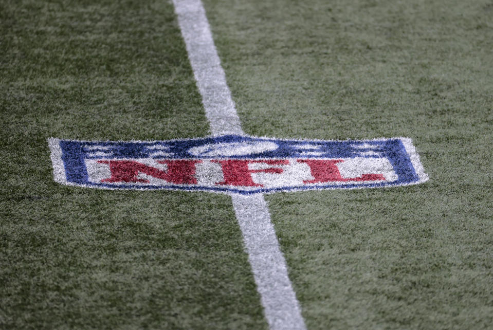 NFL logo on the field during a game.