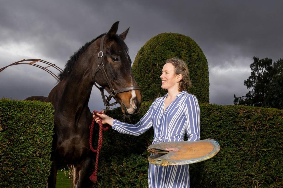 Frances Bell with her former racehorse Definite Wisdom (Dillon Bryden) in her garden in Northumberland