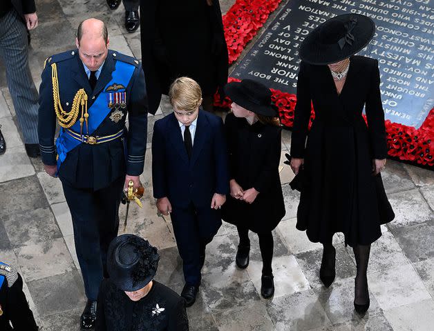 Gareth Cattermole/Getty Prince William, Prince George, Princess Charlotte and Kate Middleton at Queen Elizabeth's funeral in Sept. 2022