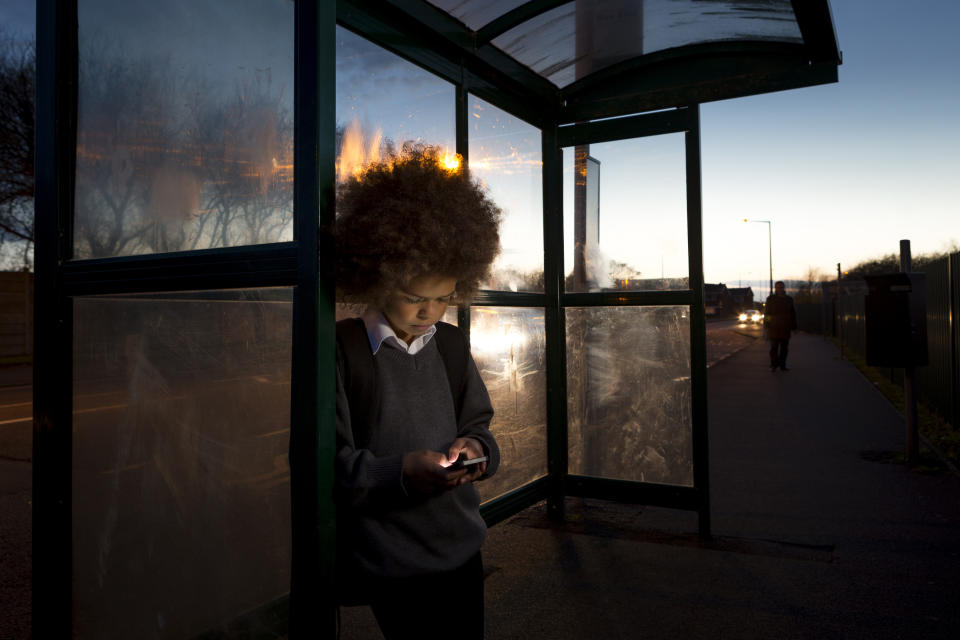 Mobiles can be useful for children to keep in touch with their parents. (Getty Images)