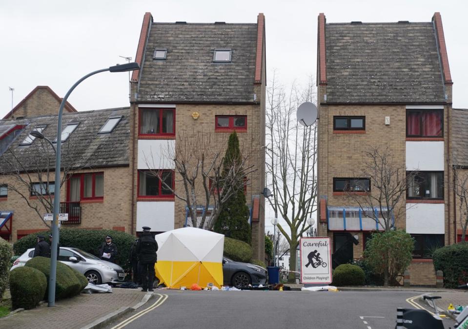 Police officers guard the crime scene in Bywater Place (Lucy North/PA Wire)