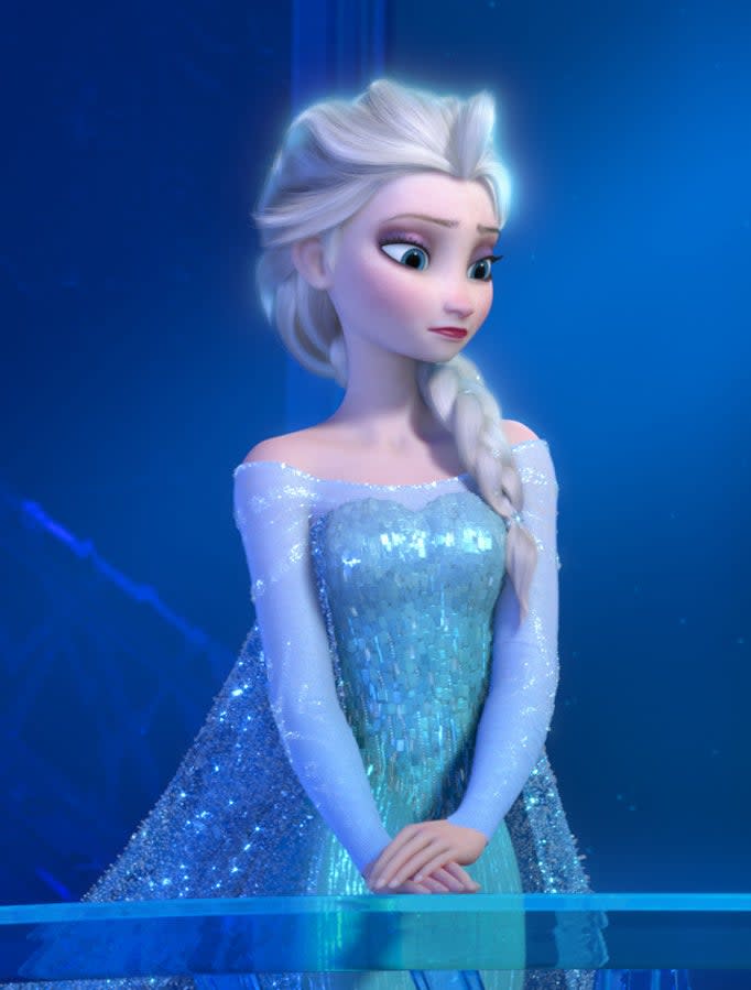 Elsa in a sparkly dress and large braid