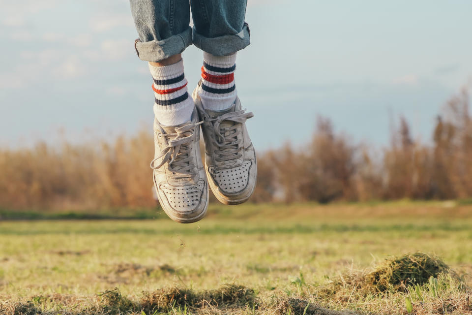 frame of feet jumping; asset light models