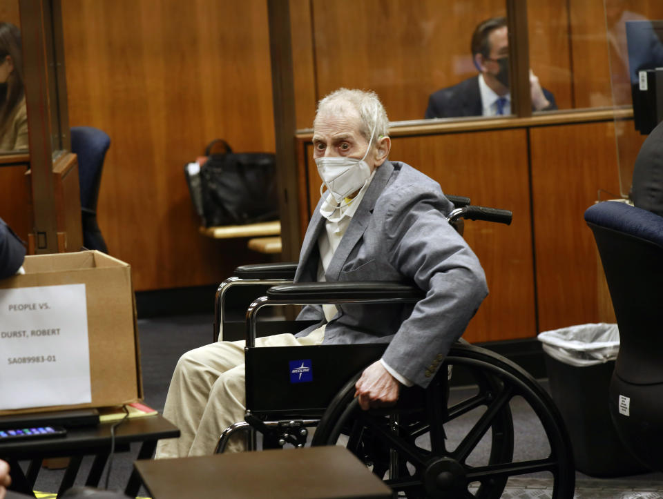 Robert Durst spins his wheelchair s in place as he looks at people in the courtroom in Inglewood, Calif. on Wednesday, Sept. 8, 2021, with his attorneys for closing arguments presented by the prosecution in the murder trial of the New York real estate scion who is charged with the longtime friend Susan Berman's killing in Benedict Canyon just before Christmas Eve 2000. (Al Seib/Los Angeles Times via AP, Pool)
