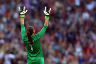 LONDON, ENGLAND - AUGUST 09: Goalkeeper Hope Solo #1 of United States reacts after Carli Lloyd #10 of United States scores a goal in the first half against Japan during the Women's Football gold medal match on Day 13 of the London 2012 Olympic Games at Wembley Stadium on August 9, 2012 in London, England. (Photo by Julian Finney/Getty Images)