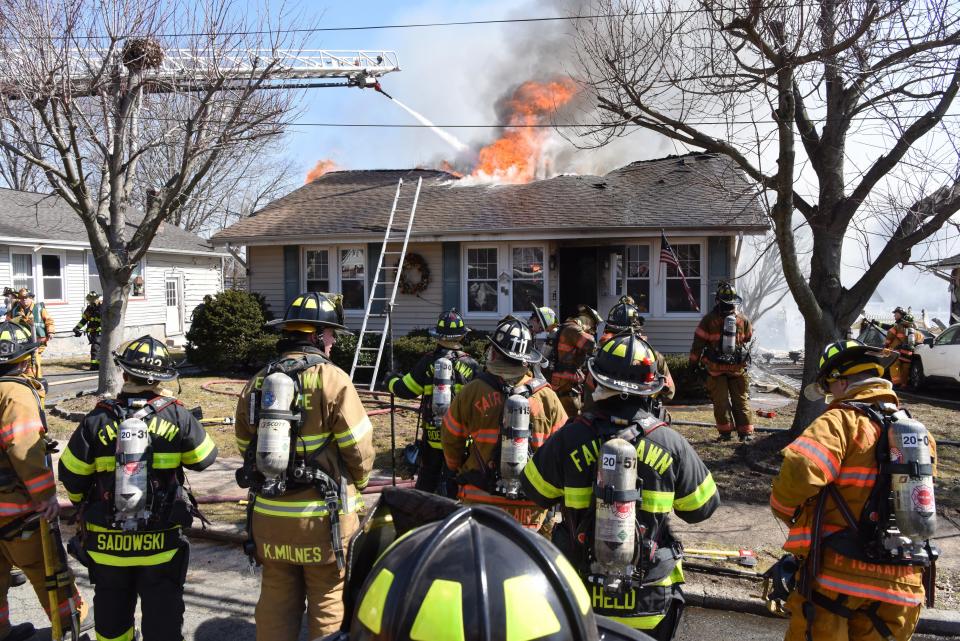 Fair Lawn firefighters battle a 2nd alarm fire that gutted a home on Pomona Ave in Fair Lawn, N.J. on Tuesday March 9, 2021. The homeowners home at the time of the fire and were evaluated by EMS at the scene according to Fair Lawn Fire Chief Tom Carney.