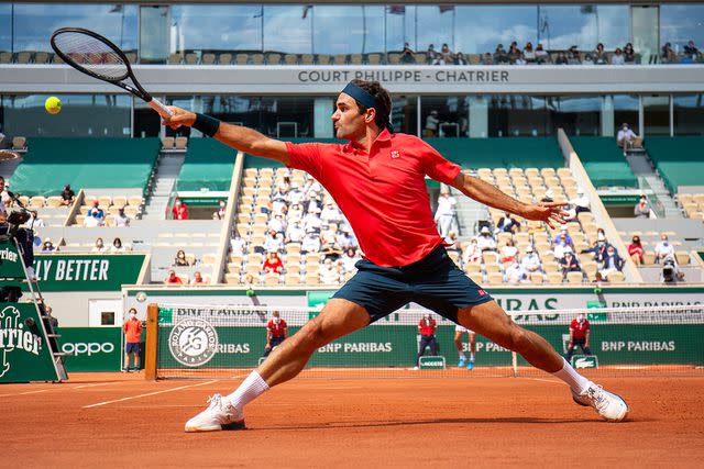 <p>Tim Clayton/Corbis via Getty </p> Roger Federer at the 2021 French Open