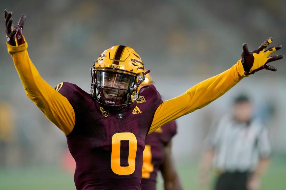 Arizona State defensive back Jack Jones (0) celebrates a defensive stop against Southern Utah during the first half of an NCAA college football game, Thursday, Sept. 2, 2021, in Tempe, Ariz. (AP Photo/Matt York)