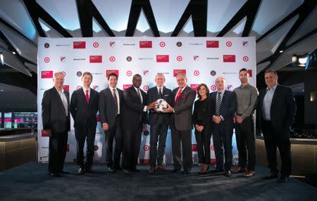 Oct 23, 2017; Atlanta, GA, USA; Atlanta Mayor Kasim Reed, MLS Commissioner Don Garber, center, and Atlanta United owner Arthur Blank hold the MLS soccer ball and pose for a photograph during the press conference that Atlanta will host the MLS 2018 All-Star game at Mercedes-Benz Stadium. Mandatory Credit: Jason Getz-USA TODAY Sports