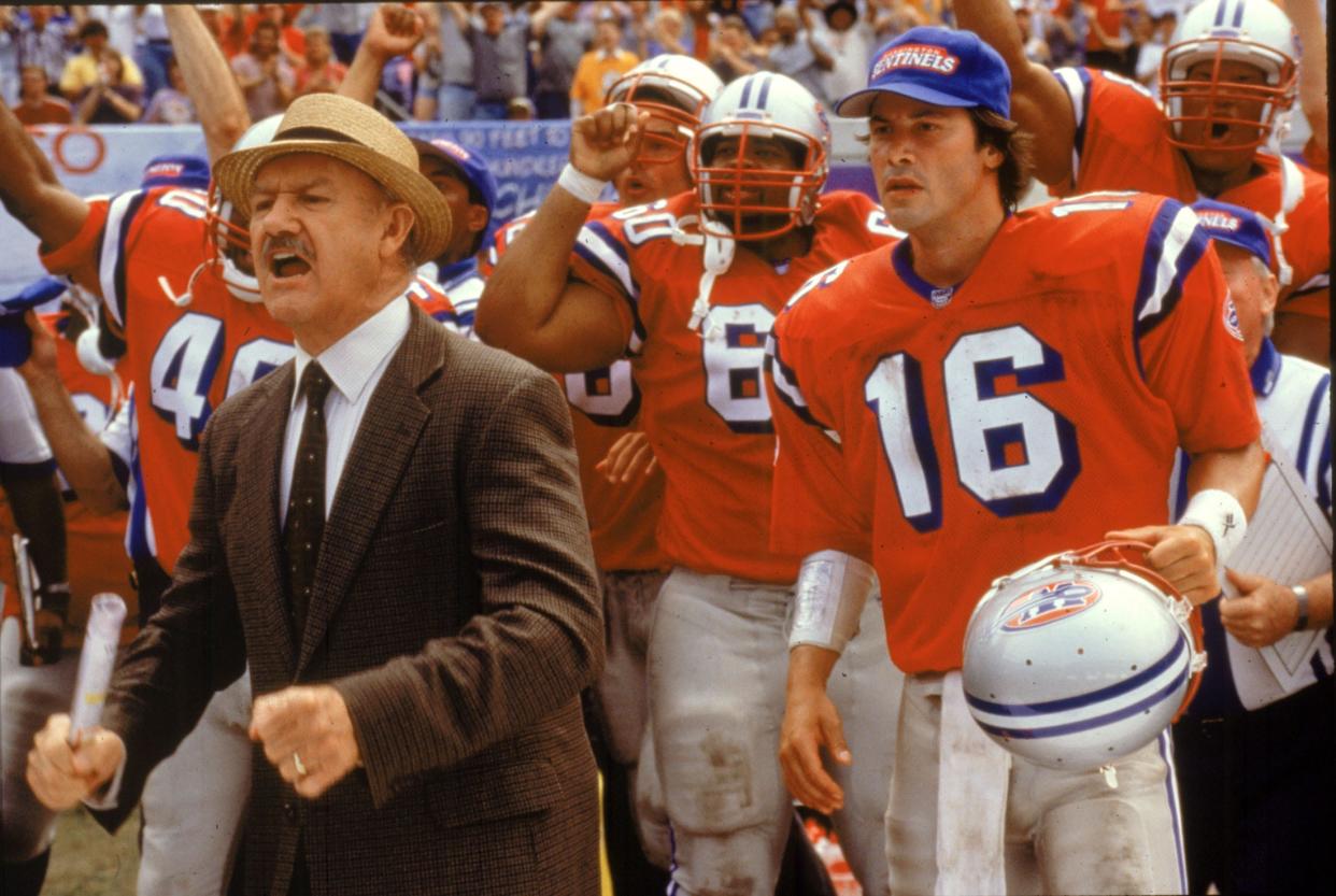 A coach (Gene Hackman, left) and an unlikely star quarterback (Keanu Reeves) head up a motley gridiron crew in "The Replacements."