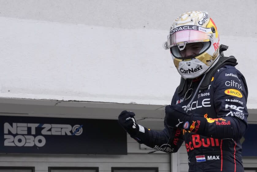 Red Bull driver Max Verstappen of the Netherlands celebrates after winning the Hungarian Formula One Grand Prix at the Hungaroring racetrack in Mogyorod, near Budapest, Hungary, Sunday, July 31, 2022. (AP Photo/Darko Bandic)