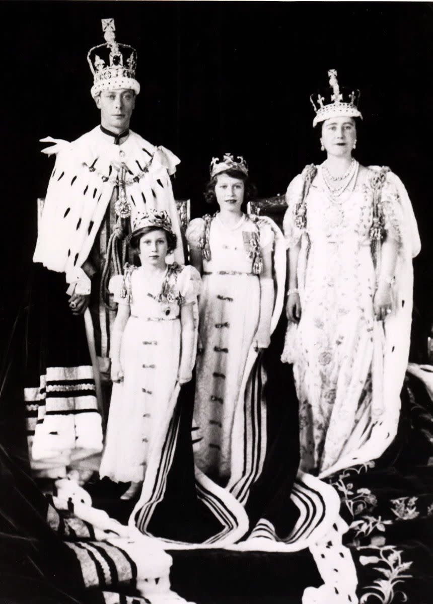 George VI, Queen Elizabeth II's father, is crowned king on May 12, 1937. He is pictured after his coronation in this royal portrait alongside his wife Queen Elizabeth, The Queen Mother, right, and his daughters, Queen Elizabeth II, center, and Princess Margaret.