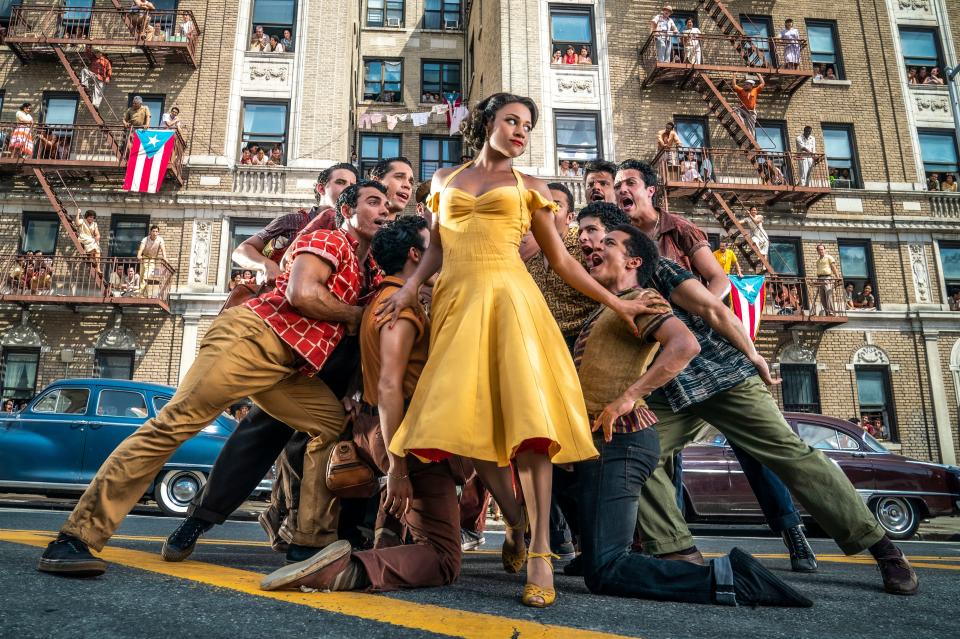 Anita (Ariana DeBose) leads the boisterous, sprawling musical number "America" in "West Side Story."
