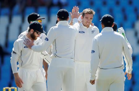 Cricket - New Zealand v South Africa - second cricket test match - Centurion Park, Centurion, South Africa - 28/8/2016. New Zealand's Tim Southee celebrates with team mates after bowling out South Africa's JP Duminy. REUTERS/Siphiwe Sibeko