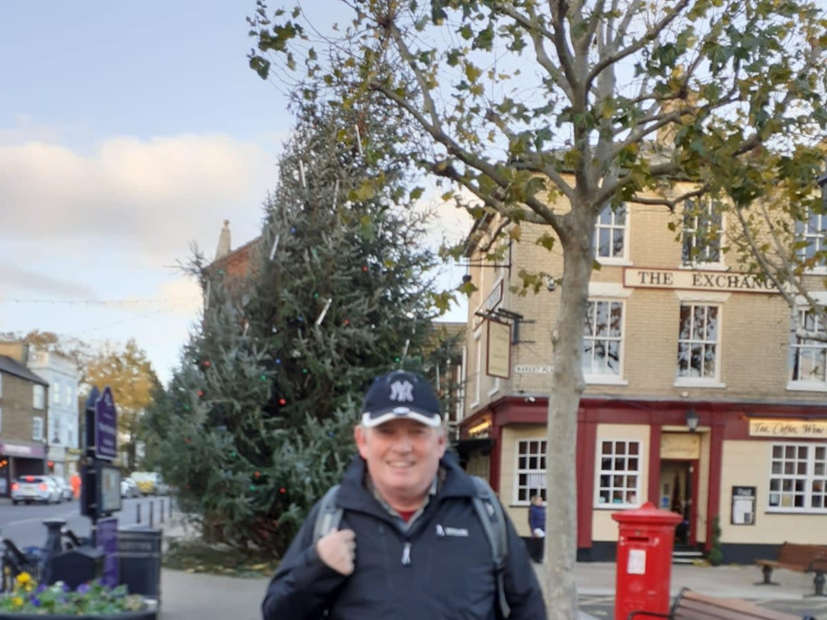 Councillor Stephen Court sees the funny side of the ‘wonky tree’ - and thinks it could attract more tourists to the town (Stephen Court)