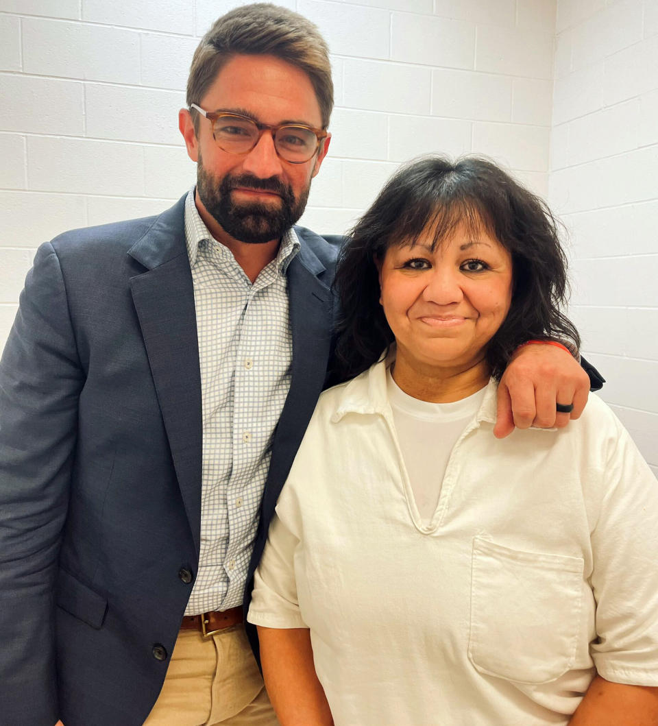 In this April 6, 2022 photo provided by Texas state Rep. Jeff Leach, Rep. Leach stands next to death row inmate Melissa Lucio during a visit by a group of seven lawmakers to the Mountain View Unit in Gatesville, Texas. The lawmakers visited Lucio to update her about their efforts to stop her April 27 execution. The lawmakers say they are troubled by Lucio’s case and believe her execution should be stopped as there are legitimate questions about whether she is guilty. (Texas state Rep. Jeff Leach via AP)