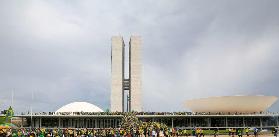 <div class="inline-image__caption"><p>Supporters of Brazilian former President Jair Bolsonaro invade the National Congress in Brasilia on January 8, 2023.</p></div> <div class="inline-image__credit">SERGIO LIMA/AFP/Getty</div>