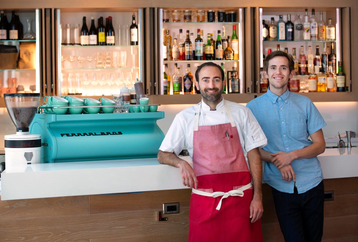 Tony Ferrari, left, and his brother Austin operate Fausto in the lobby of the CAC in downtown Cincinnati. The restaurant is named after their father and great-uncle, who shared the Italian name. Fausto announced Monday that it is closing.