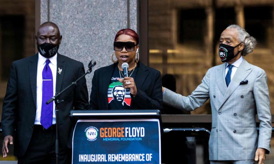 George Floyd’s sister Bridgett speaks in Minneapolis on Sunday, flanked by Rev Al Sharpton, right, and lawyer Ben Crump.