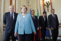 From the left, Britain's Prime Minister Boris Johnson, German Chancellor Angela Merkel, French President Emmanuel Macron, Italian Premier Giuseppe Conte and President of the European Council Donald Tusk pose during a G7 coordination meeting with the Group of Seven European members at the Hotel du Palais in Biarritz, southwestern France, Saturday, Aug.24, 2019. Efforts to salvage consensus among the G-7 rich democracies frayed Saturday in the face of U.S. President Donald Trump's unpredictable America-first approach even before the official start of the summit in southern France. (AP Photo/Markus Schreiber, Pool)