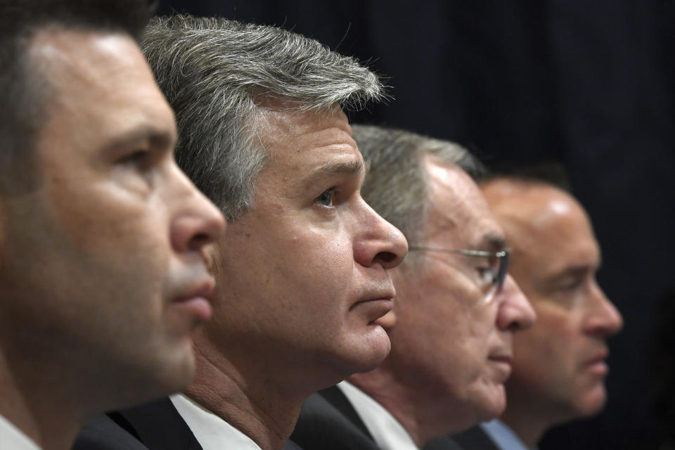 Acting Homeland Security Secretary Kevin McAleenan, left, FBI Director Christopher Wray, second from left, acting Director of the National Counterterrorism Center at the office of the Director of National Intelligence Russell Travers, second from right, and Department of Homeland Security undersecretary for intelligence and analysis David J. Glawe, right, wait to testify before the House Homeland Security Committee on Capitol Hill in Washington, Wednesday, Oct. 30, 2019, during a hearing on domestic terrorism. (AP Photo/Susan Walsh)