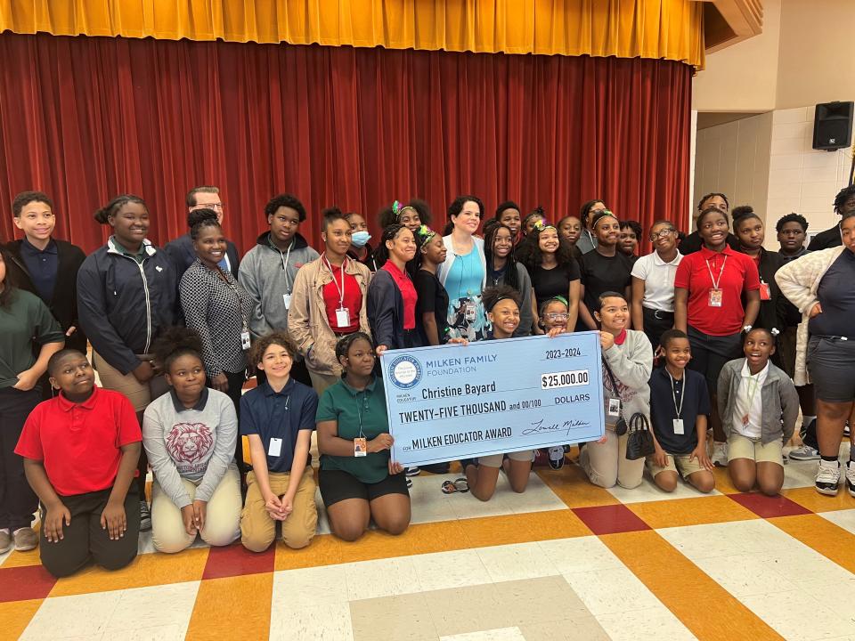 Christine-Bayard recipient of the Milken Educator Award, with her sixth-grade students.