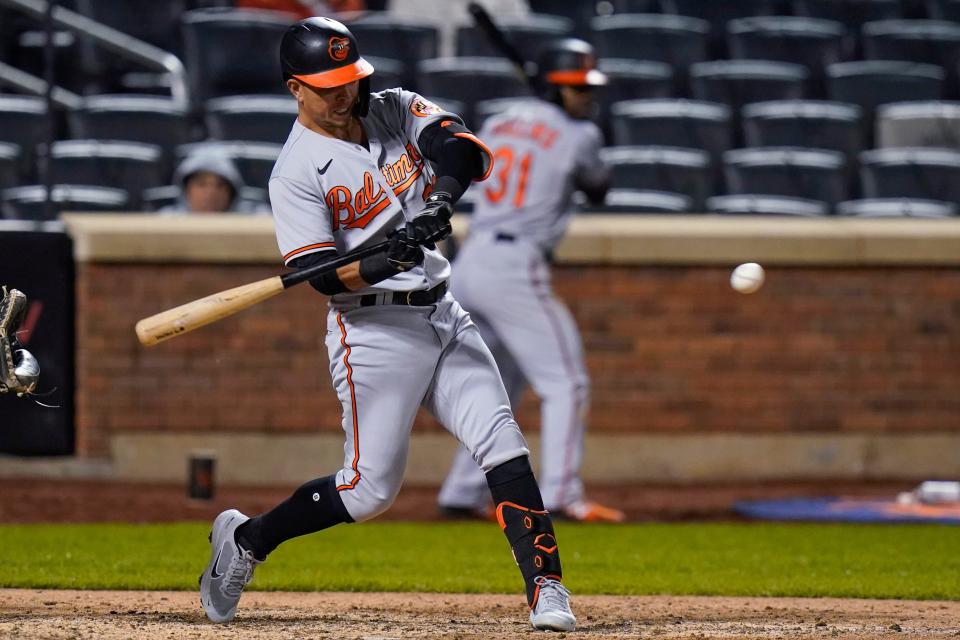 Baltimore Orioles' Ramon Urias hits a single against the Mets last season.