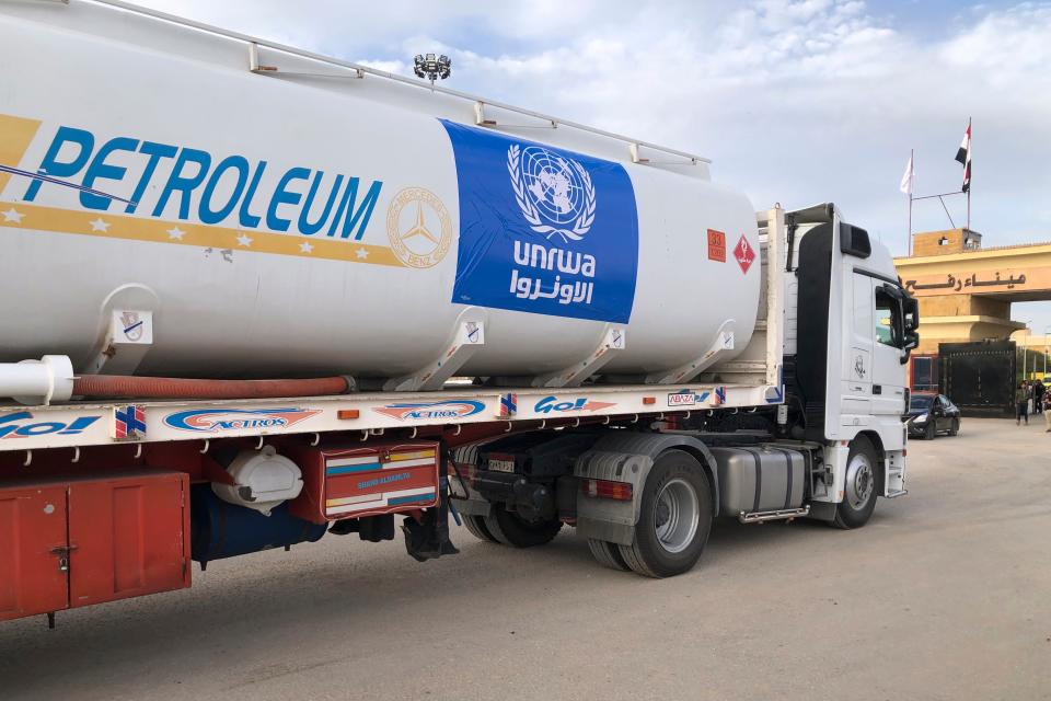 An Egyptian truck delivering fuel to the Gaza Strip waits to cross the Rafah border crossing (Copyright 2023The Associated Press. All rights reserved)