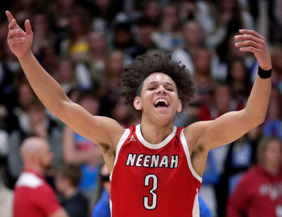 Neenah's Chevalier Emery Jr., who made a 3-point shot at the buzzer, reacts to the Rockets' win over Kimberly in a WIAA Division 1 sectional semifinal game in Kaukauna on Thursday.