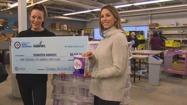 Jets' wives and girlfriends donate $9,500 in formula to Winnipeg Harvest