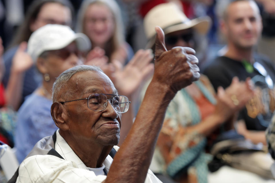 World War II veteran Lawrence Brooks celebrates his 110th birthday at the National World War II Museum in New Orleans, Thursday, Sept. 12, 2019. Brooks was born Sept. 12, 1909, and served in the predominantly African-American 91st Engineer Battalion, which was stationed in New Guinea and then the Philippines during World War II. He was a servant to three white officers in his battalion. (AP Photo/Gerald Herbert)
