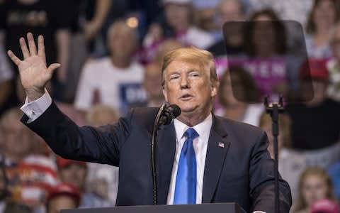 Donald Trump speaks during a rally in Wilkes-Barre, Pennsylvania in August 2018 - Credit: Victor J. Blue/Bloomberg