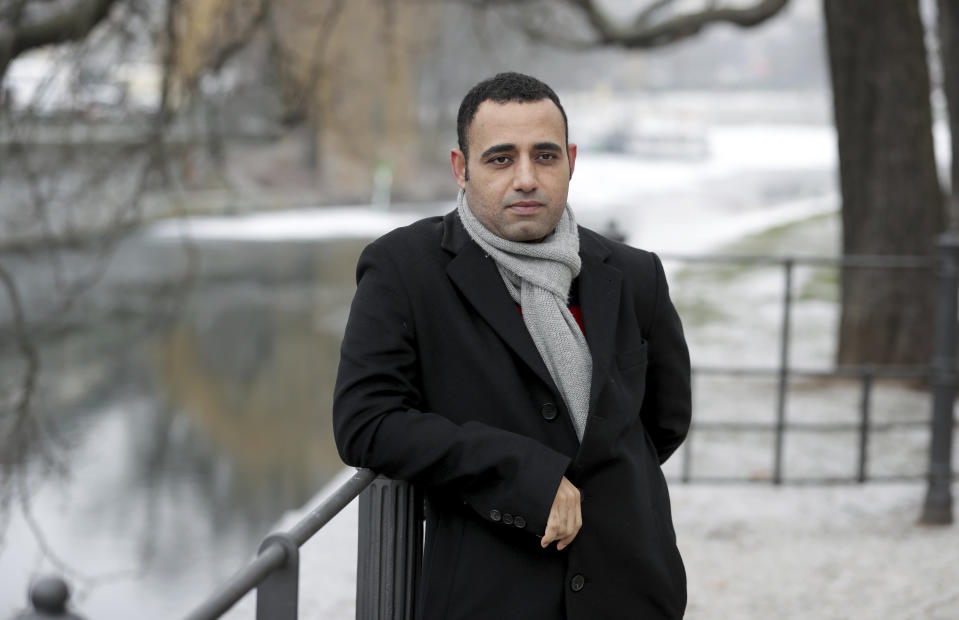 Egyptian political exile and academic Taqadum al-Khatib poses for a photograph in Berlin, Jan. 18, 2021. The Jan. 25, 2011, uprising in Tahrir Square led to the quick ouster of autocrat Hosni Mubarak. A decade later, thousands are estimated to have fled abroad to escape a state, headed by President Abdel Fattah el-Sissi, that is even more oppressive. (AP Photo/Michael Sohn)