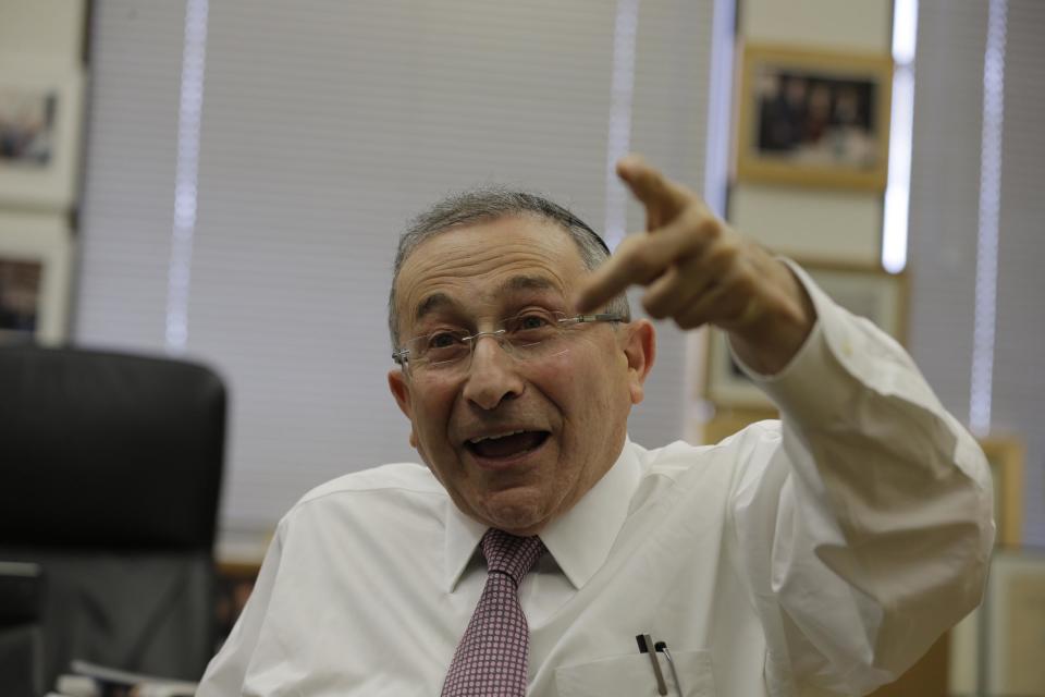 In this Friday, May 3, 2013 photo, founder Rabbi Marvin Hier gestures during an interview at the Wiesenthal Center in Los Angeles. Hier has inspired top talents such as Elizabeth Taylor, Morgan Freeman, Sandra Bullock, Michael Douglas, and Nicole Kidman to donate their time to Moriah Films' productions. The Wiesenthal Center’s Oscar-winning film division issues its 13th historical movie, "The Prime Ministers," on Nov. 6, 2013. (AP Photo/Reed Saxon)