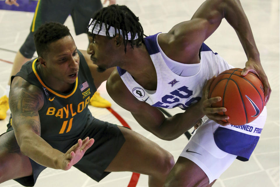 Baylor guard Mark Vital (11) defends against TCU guard RJ Nembhard (22) in the first half of an NCAA college basketball game, Saturday, Jan. 9, 2021, in Fort Worth, Texas. (AP Photo/ Richard W. Rodriguez)